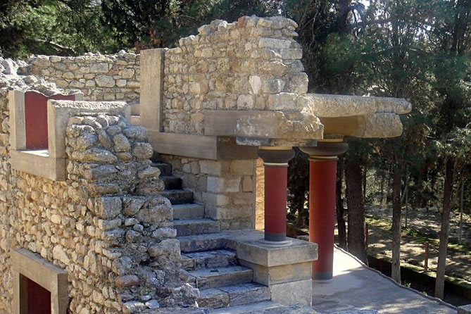 Ancient ruins and restored columns at Knossos archaeological site